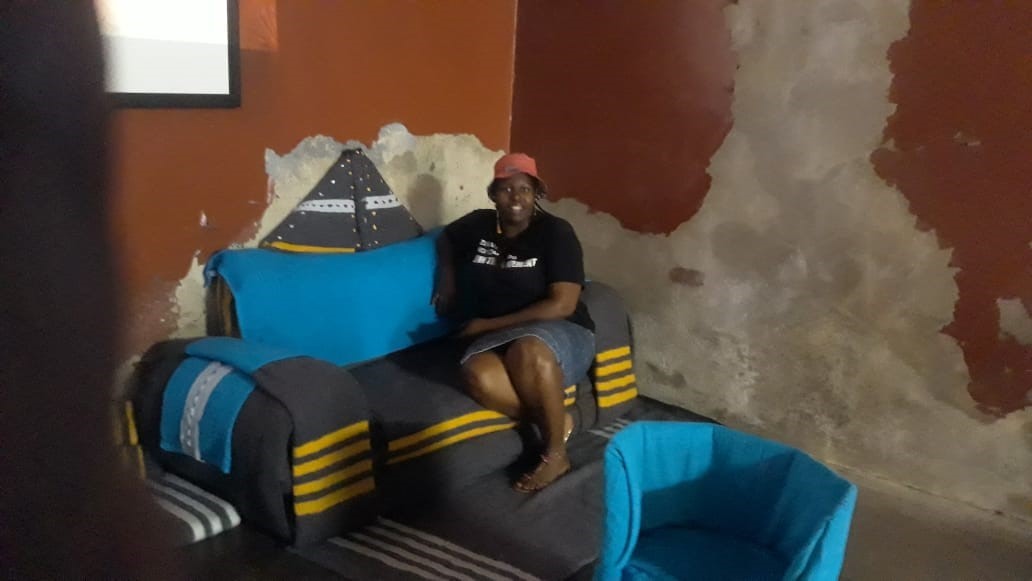Constitution Hill: Conhill tour guide Lorraine Mhlari testing out the Gang leader’s two-seater couch
