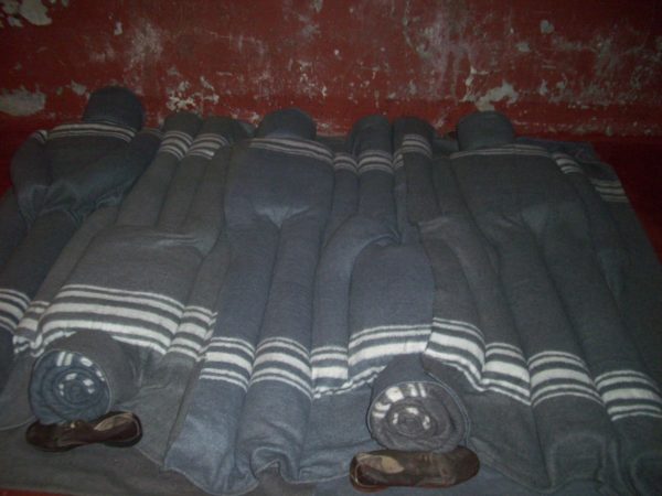 Constitution Hill: Blanket sculptures depicting how prisoners slept packed tightly together in a cell far too small for the number of inhabitants